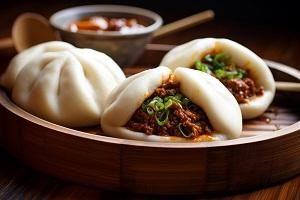 Xingren bao (almond-stuffed buns, a twist on traditional Chinese bao)