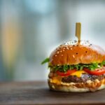 Juicy Burger on Wooden Surface