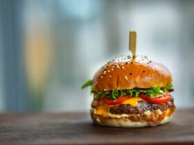 Juicy Burger on Wooden Surface