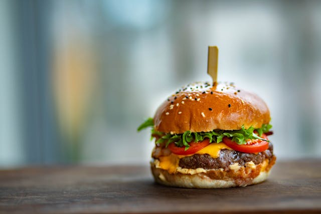 Juicy Burger on Wooden Surface