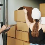 Man and Woman Checking the Packages