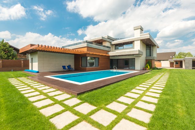 Backyard Swimming Pool under Blue Sky