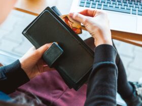 A lady holding her mastrcard